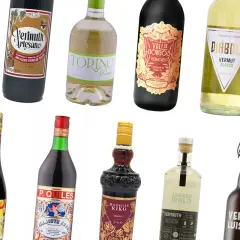 Varias botellas de vermut, mostrando la diversidad de qué es el vermut en España: rojo, blanco y artesano.